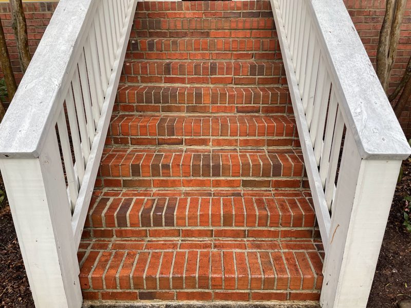 A cleaned masonry surface on a commercial property