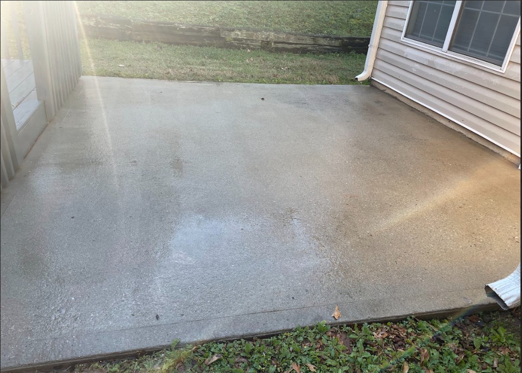 Concrete surface after pressure washing by Thrare Contracting