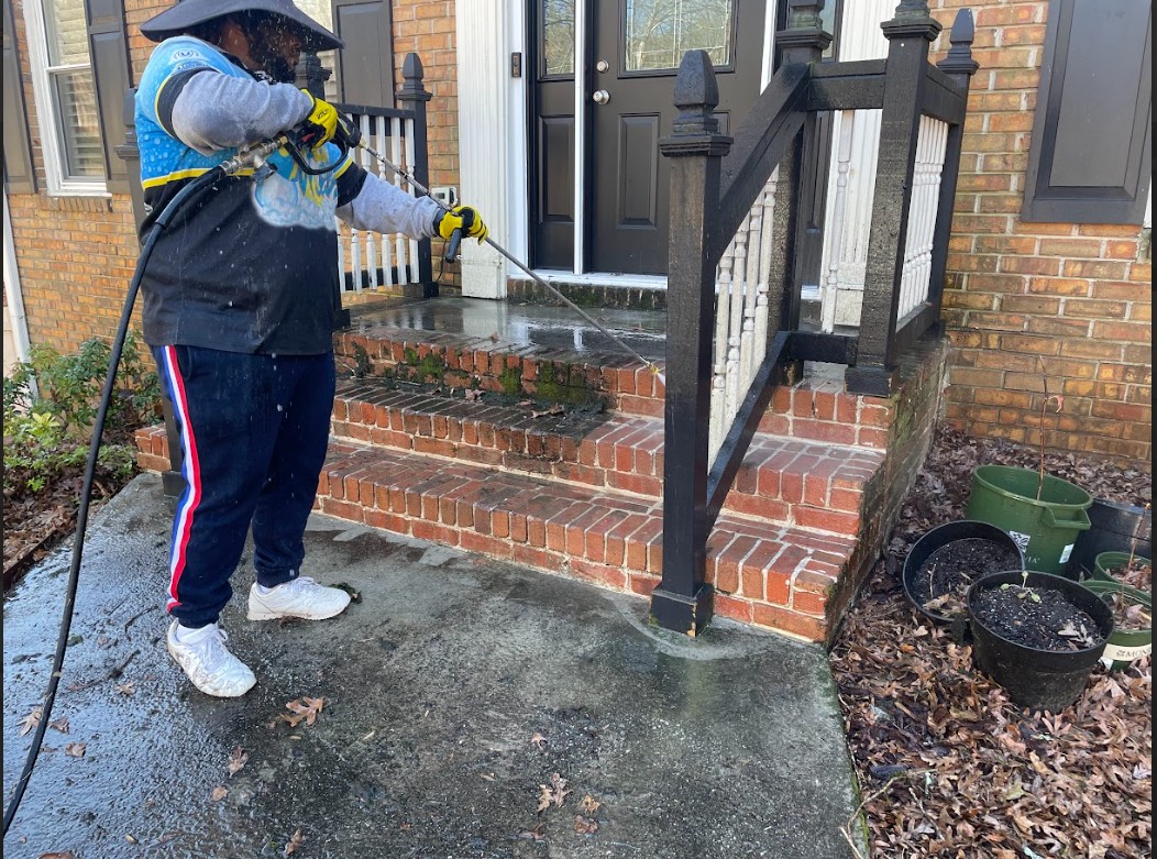 Front steps pressure washing by Thrare Contracting