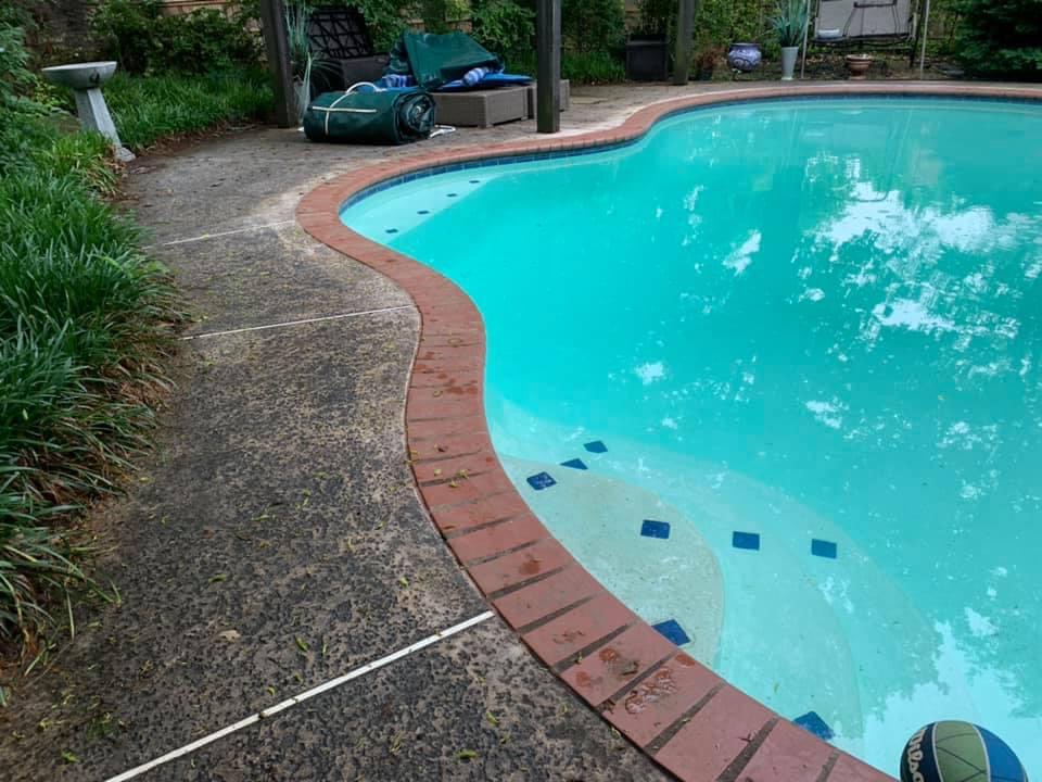 Pool deck surface before cleaning by Thrare Contracting